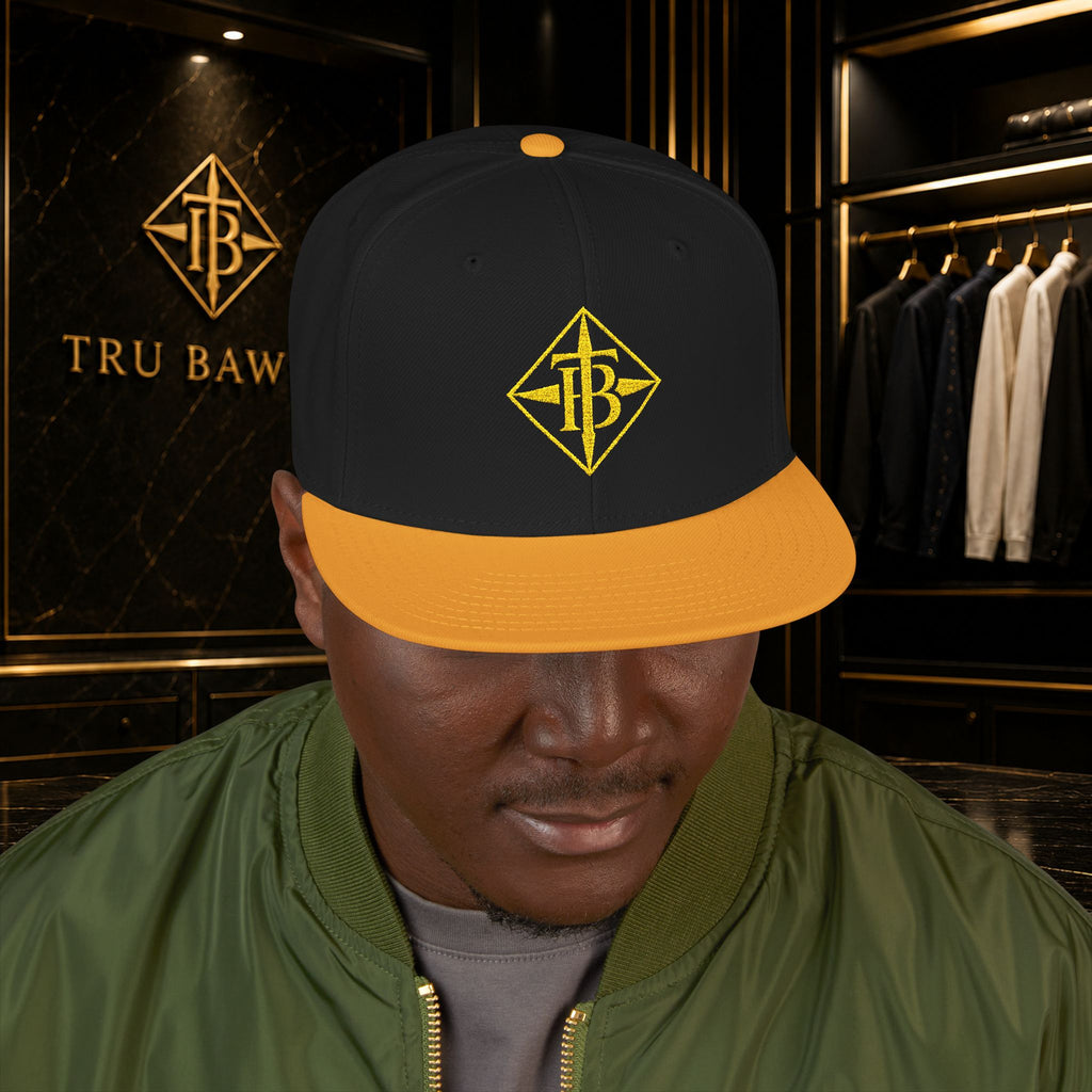 Gold Embroidered Snapback Cap — Minimal Geometric Logo, Adjustable Flat Brim